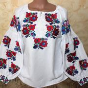 Вышитая женская блузка цветные калачики фото